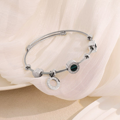 Braid Pattern Letter Bangle In Gold Titanium Steel With Spring Ring Trigger Clasp Closure