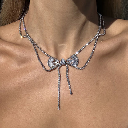 Silver Tassel Bow Tie Layered Necklace For Women Featuring Rhinestone Pendant In Alloy