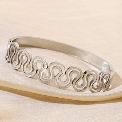 Retro Style Titanium Steel Bangle With 18K Real Gold Electroplated Finish In Gold