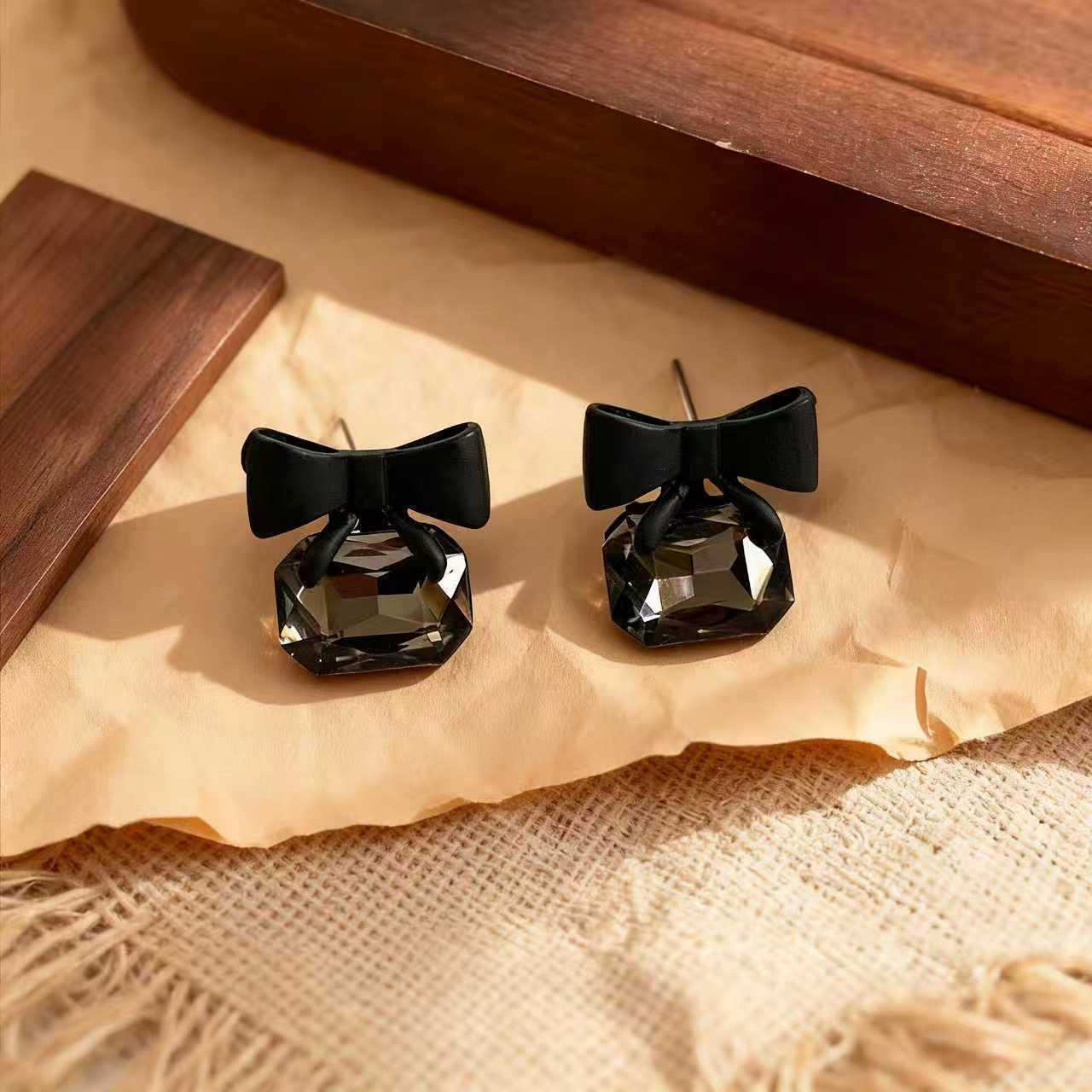 Sweet Bow Tie Stud Earrings With Alloy And Crystal Inlay Featuring 925 Sterling Silver Ear Pins In Dyed Black