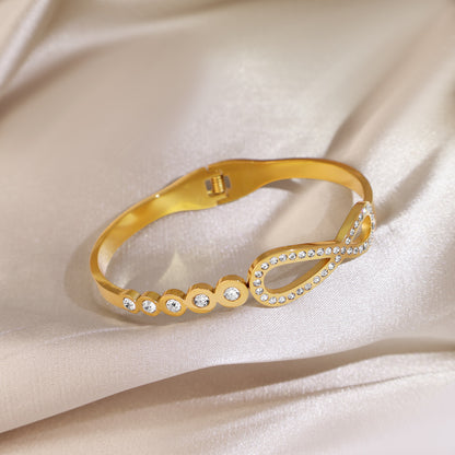 Infinity Pattern Titanium Steel Bangle With Zircon Inlay, Electroplated Gold Plating