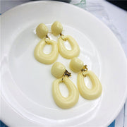beige Triangular Clip