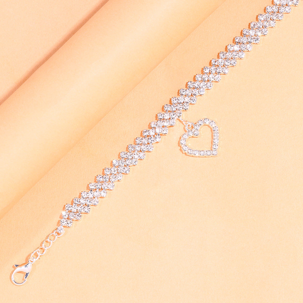 Women's Gold Alloy Anklet With Heart Shape Pattern And Artificial Gemstones, Perfect For Beach Wear