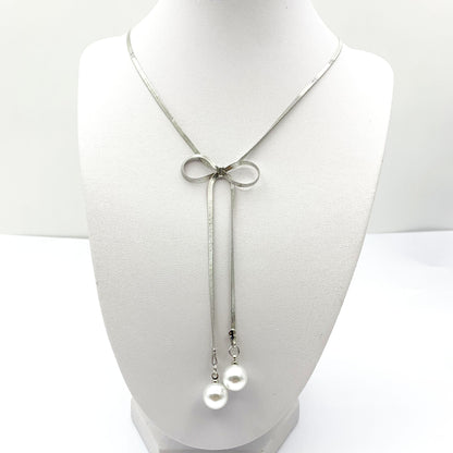Silver Metal Bow Tie Necklace For Women Featuring Imitation Pearl Pendant, Perfect For Wedding Occasions