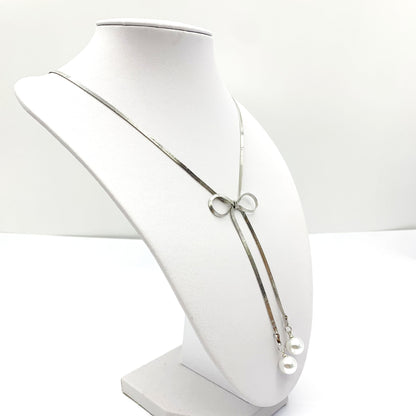 Silver Metal Bow Tie Necklace For Women Featuring Imitation Pearl Pendant, Perfect For Wedding Occasions