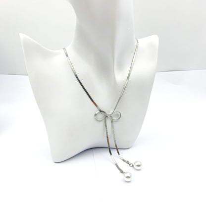 Silver Metal Bow Tie Necklace For Women Featuring Imitation Pearl Pendant, Perfect For Wedding Occasions
