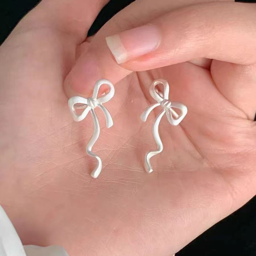 Sweet Bow Tie Clip Earrings For Women In Electroplated Alloy Finish