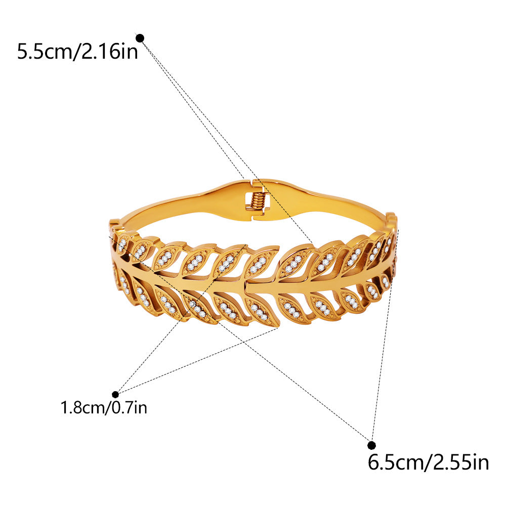 Exaggerated Stripe Bangle In Gold Titanium Steel With Electroplated Finish