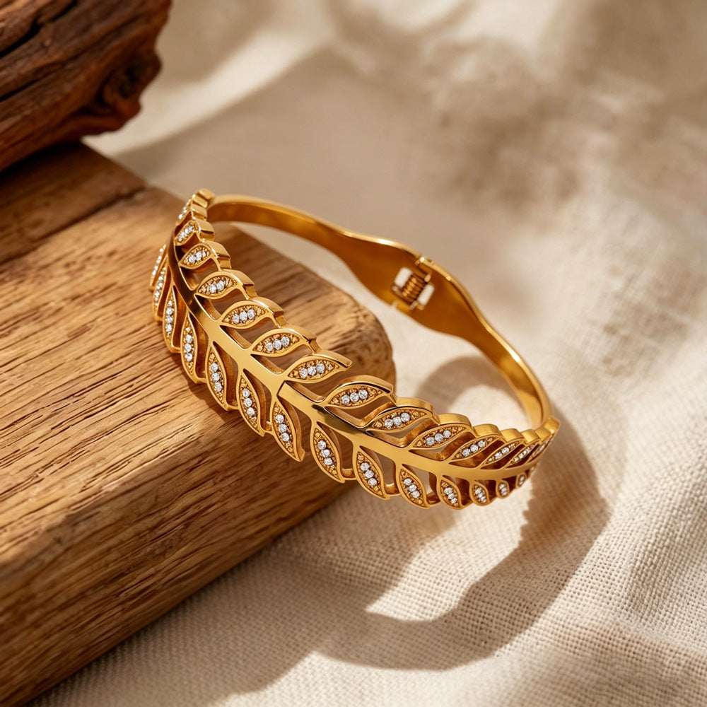 Exaggerated Stripe Bangle In Gold Titanium Steel With Electroplated Finish