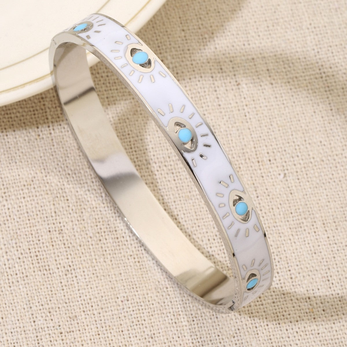 Novelty Eye Bangle For Women In Gold Titanium Steel With Electroplated Gold Plating