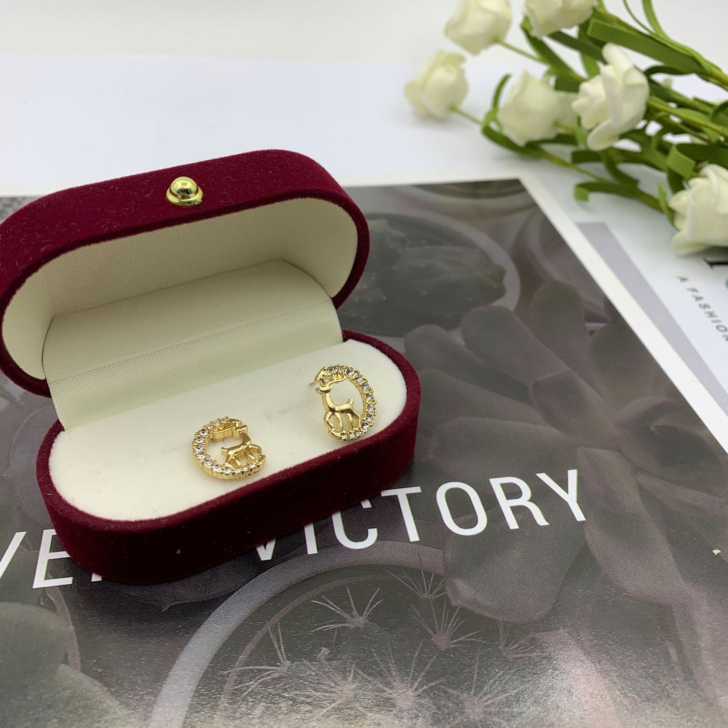 Elk Stud Earrings For Women In Silver Alloy With Electroplated Finish And Artificial Gemstones