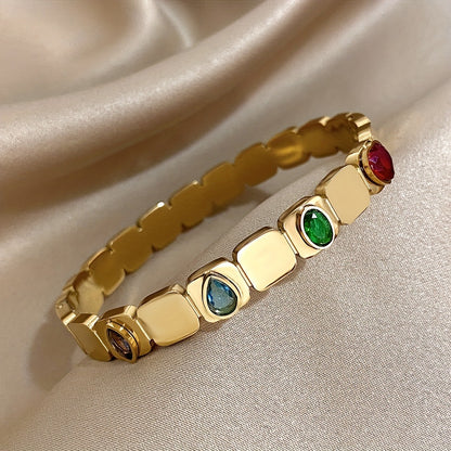 Women’s Water Droplets Bangle In Gold Titanium Steel With Electroplated Finish And Zircon Inlay