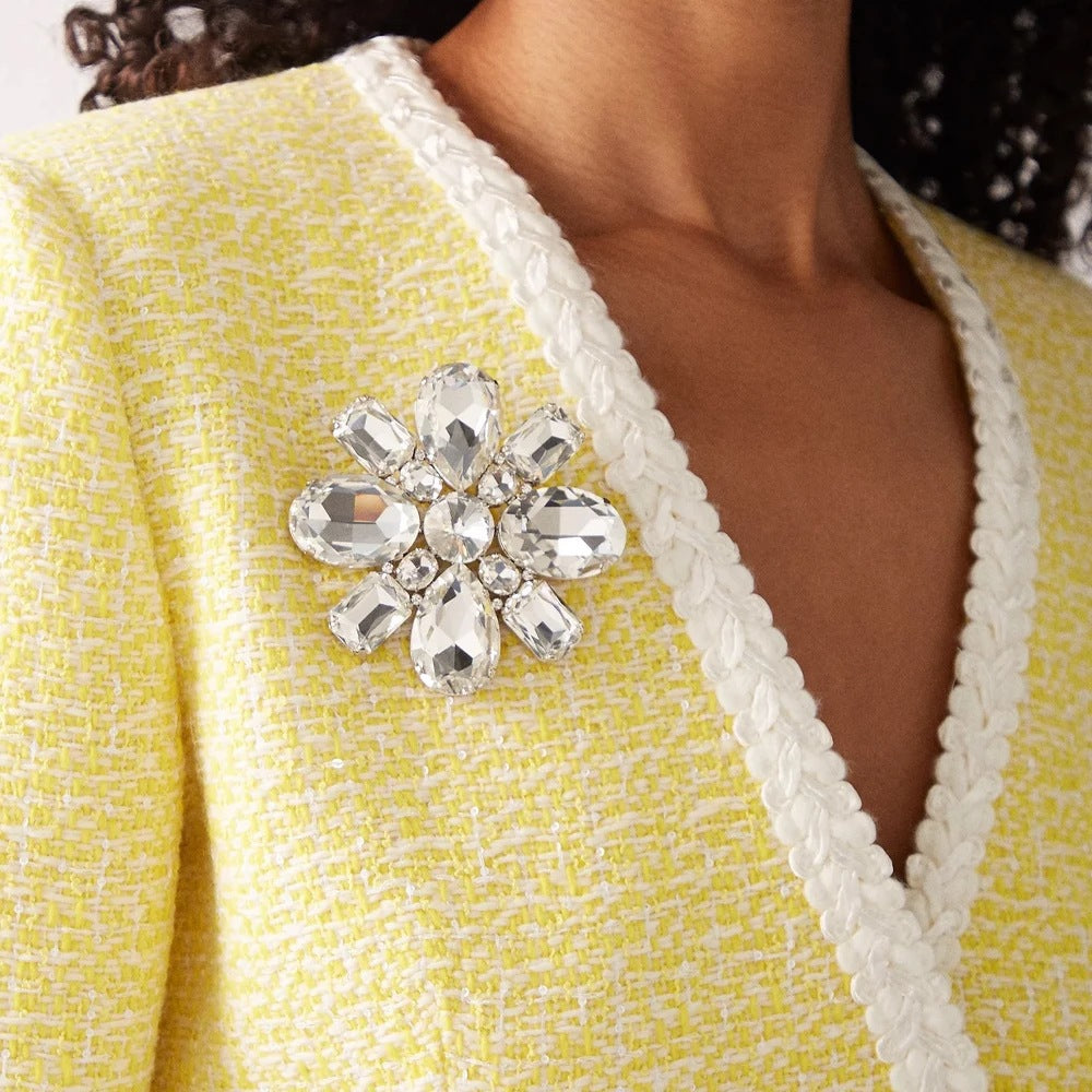 Elaborate Gold Alloy Brooch For Women With White Crystal Inlay Featuring Beautiful Flower Design