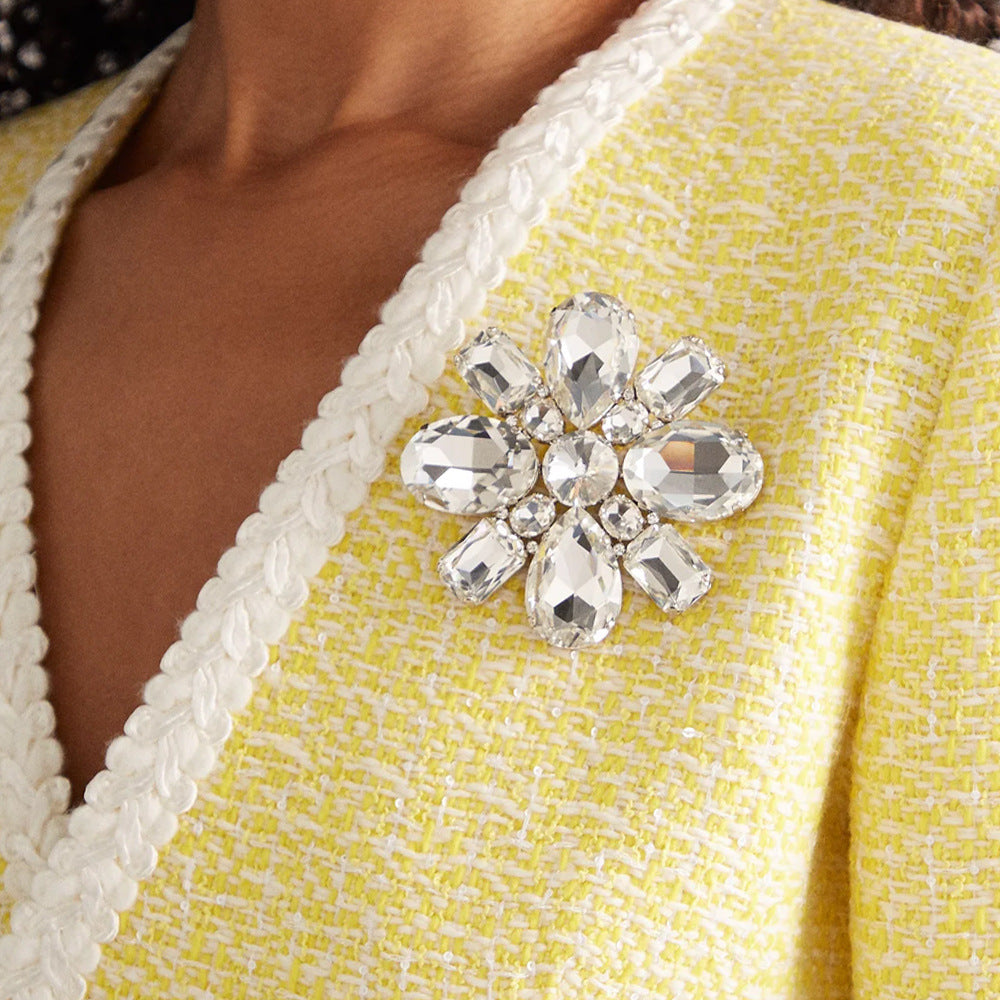 Elaborate Gold Alloy Brooch For Women With White Crystal Inlay Featuring Beautiful Flower Design
