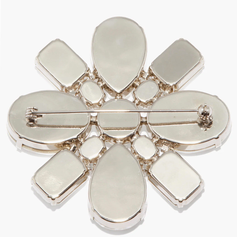 Elaborate Gold Alloy Brooch For Women With White Crystal Inlay Featuring Beautiful Flower Design