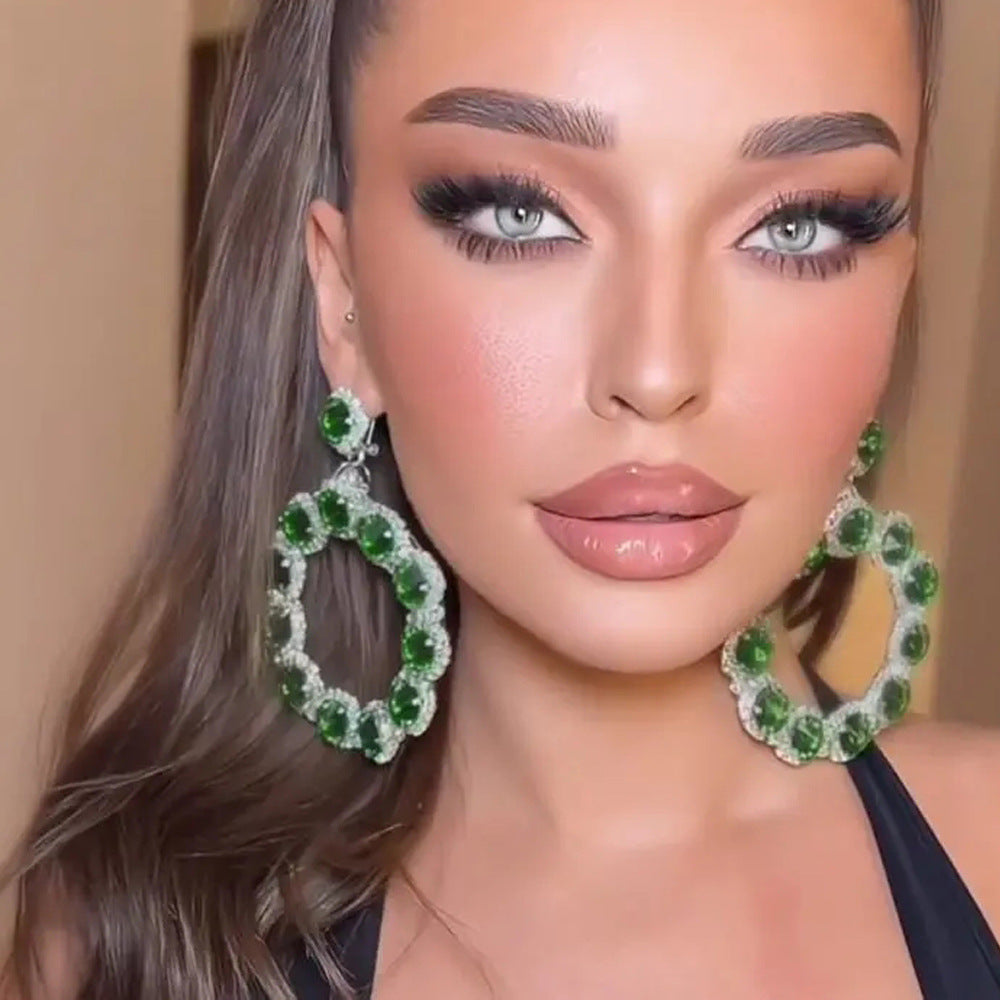Luxurious Round Silver Alloy Earrings For Women Featuring May Birthstone Emerald Inlay