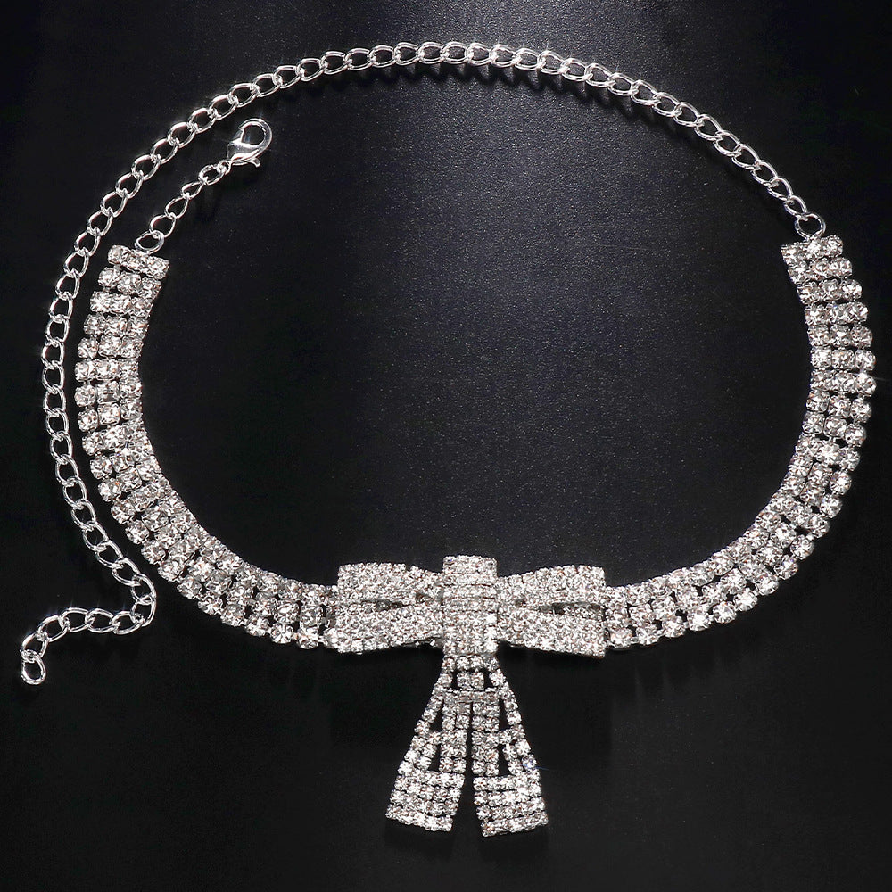 Silver Alloy Bow Tie Necklace For Women With Electroplated Finish And Rhinestone Pendant