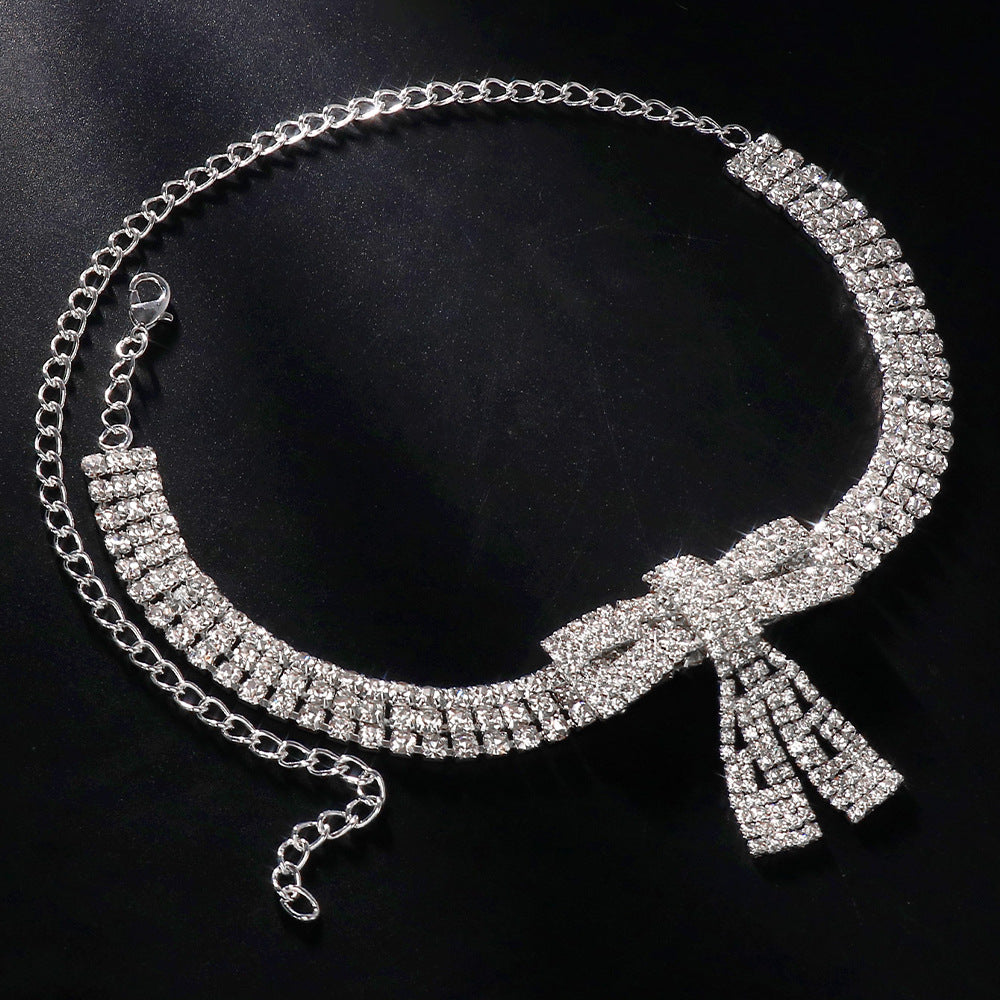 Silver Alloy Bow Tie Necklace For Women With Electroplated Finish And Rhinestone Pendant