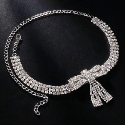 Silver Alloy Bow Tie Necklace For Women With Electroplated Finish And Rhinestone Pendant