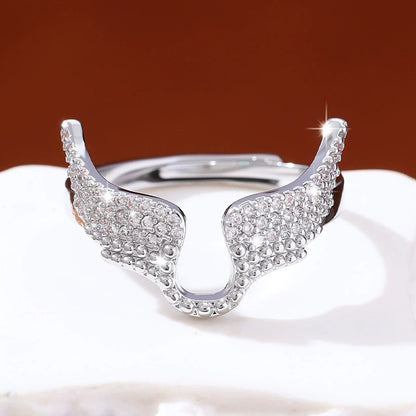 Angel Wings Ring For Women In Copper With Golden Plated Electroplated Finish Featuring Zircon Inlay