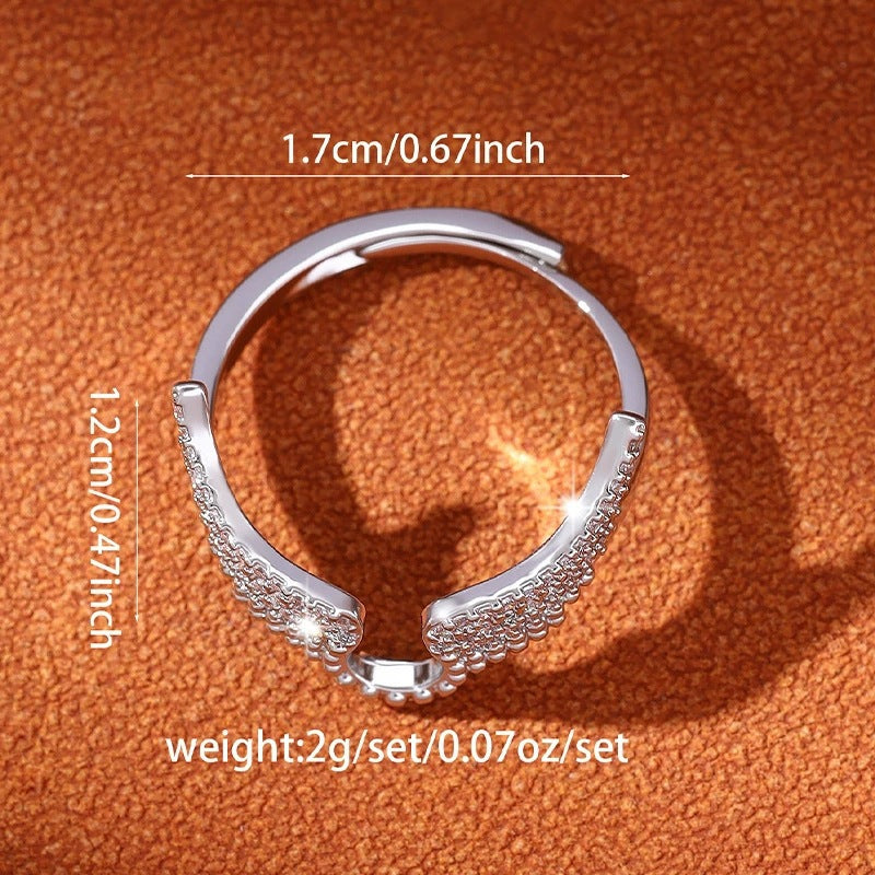 Angel Wings Ring For Women In Copper With Golden Plated Electroplated Finish Featuring Zircon Inlay