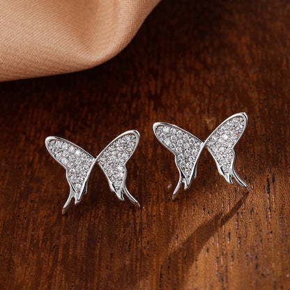 Butterfly Stud Earrings In Copper With Electroplated Finish And Zircon Inlay