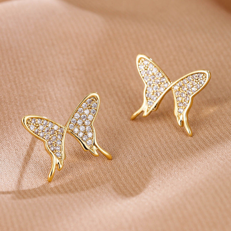 Butterfly Stud Earrings In Copper With Electroplated Finish And Zircon Inlay