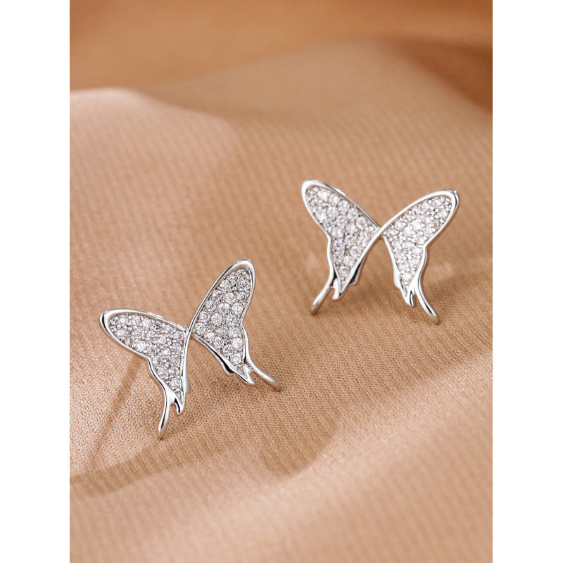 Butterfly Stud Earrings In Copper With Electroplated Finish And Zircon Inlay