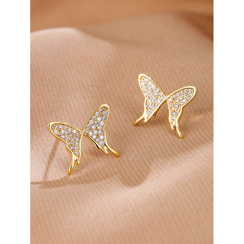 Butterfly Stud Earrings In Copper With Electroplated Finish And Zircon Inlay