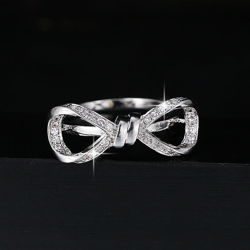 Exaggerated Bow Tie Ring For Women In Electroplated Copper With Rhinestone Inlay