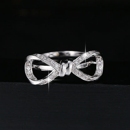 Exaggerated Bow Tie Ring For Women In Electroplated Copper With Rhinestone Inlay