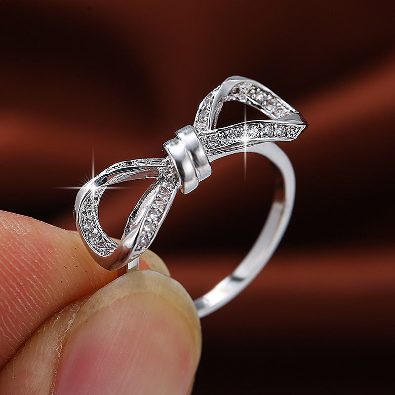 Exaggerated Bow Tie Ring For Women In Electroplated Copper With Rhinestone Inlay