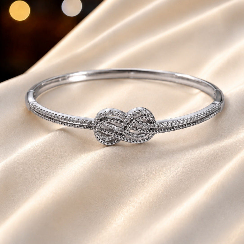 Knot Bangle In Copper With Gold Electroplated Finish, Elegant And Stylish Jewelry Accessory