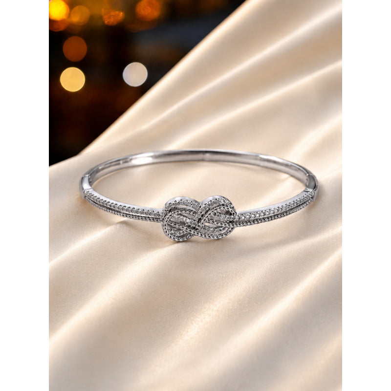 Knot Bangle In Copper With Gold Electroplated Finish, Elegant And Stylish Jewelry Accessory
