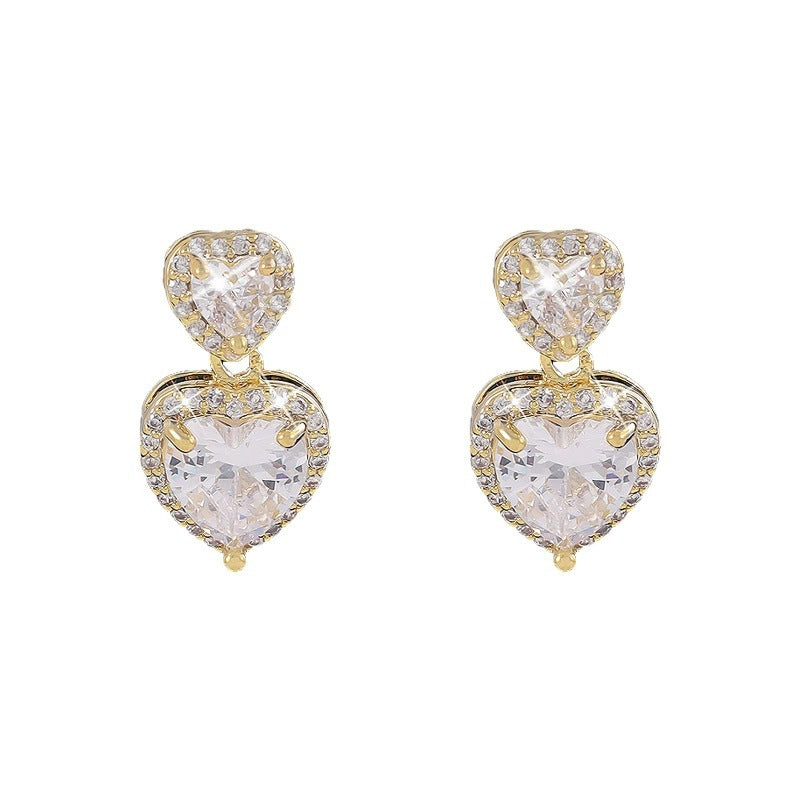 Sweet Heart Shape Stud Earrings For Women In Gold With Bezel Setting And Zircon Inlay, Made Of Copper