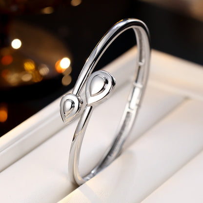 Basic Water Droplets Bangle In Gold With Electroplated Copper Material