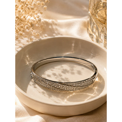 Geometric Twist Bangle In Gold Electroplated Copper Featuring Zircon Inlay