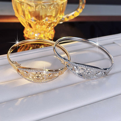 Sweet Flowers Bangle For Women In Gold Electroplated Copper