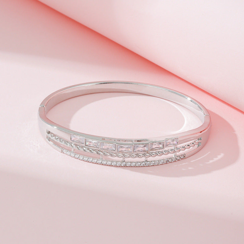 Round Braid Bangle For Women In Copper With Silver Plated Electroplated Finish Featuring Zircon Inlay