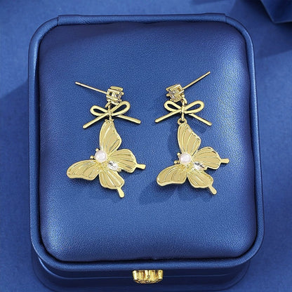 Elegant Butterfly Earrings For Women Featuring Elaborate Gold Design With Copper Ear Pins