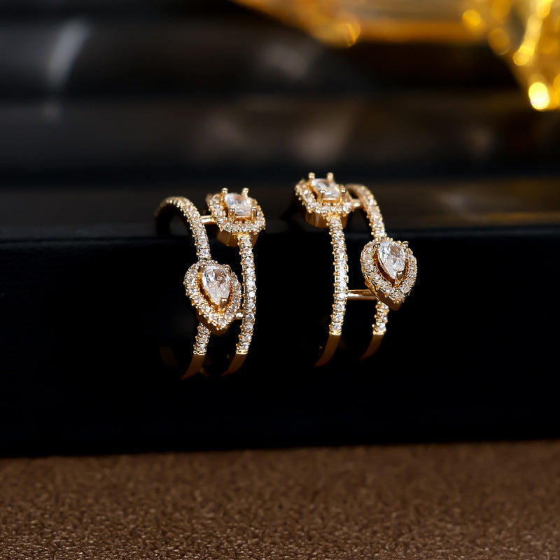 Water Droplets Earrings For Women In Gold Featuring Copper Ear Pins And Zircon Inlay