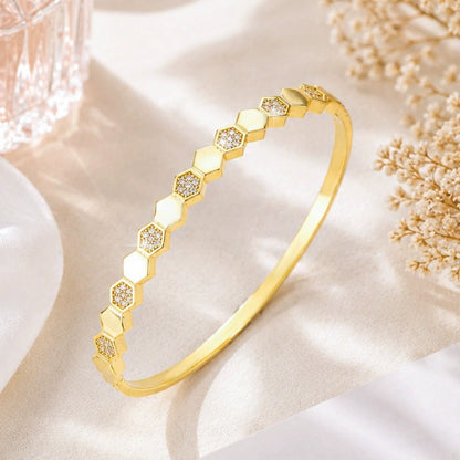 Elegant Honeycomb Bangle In Electroplated Copper Featuring A Stylish Gold Plating Process