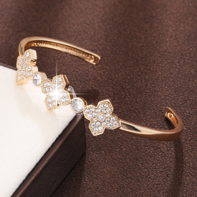 Electroplated Gold Copper Bangle With Zircon Inlay Featuring Elegant Flowers Design