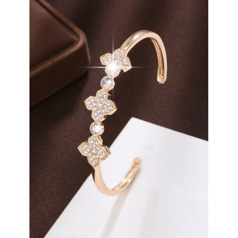 Electroplated Gold Copper Bangle With Zircon Inlay Featuring Elegant Flowers Design