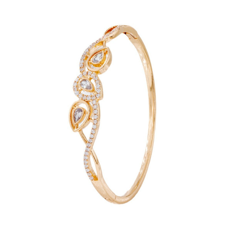 Irregular Inlay Copper Bangle For Women With Electroplated Golden Plated Finish And Zircon Inlay