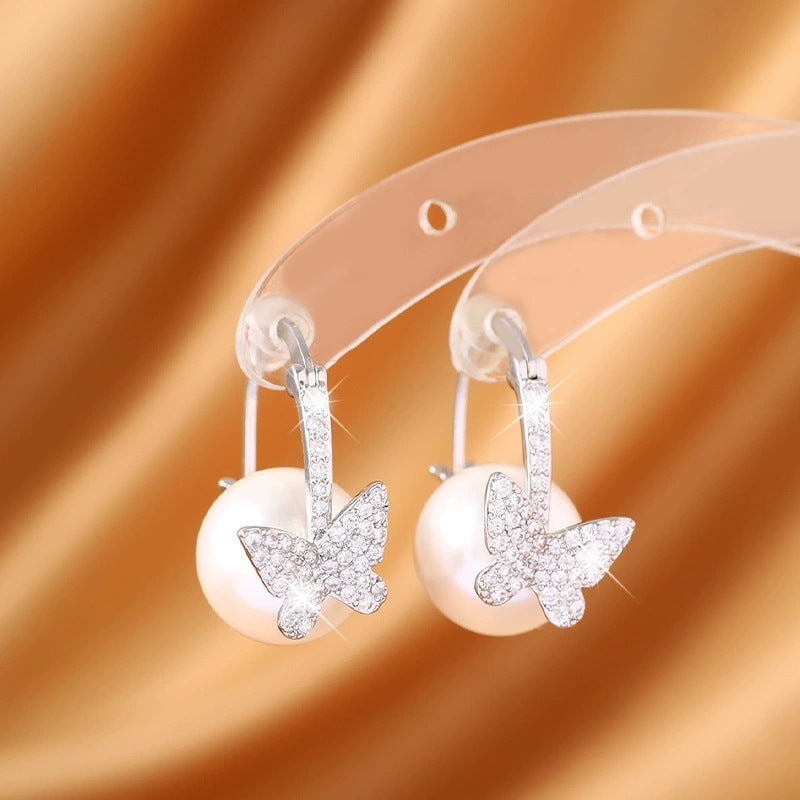 Butterfly Earrings For Women Featuring Electroplated Finish And Copper Studs With Artificial Pearl Inlay