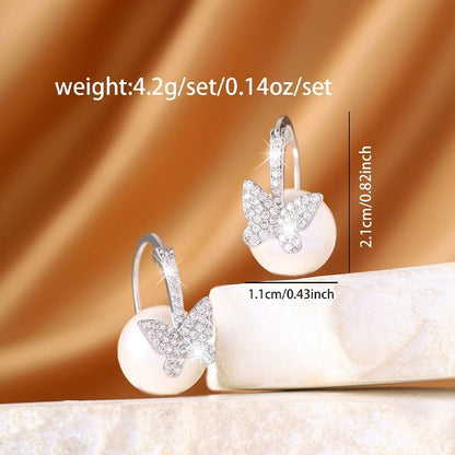 Butterfly Earrings For Women Featuring Electroplated Finish And Copper Studs With Artificial Pearl Inlay