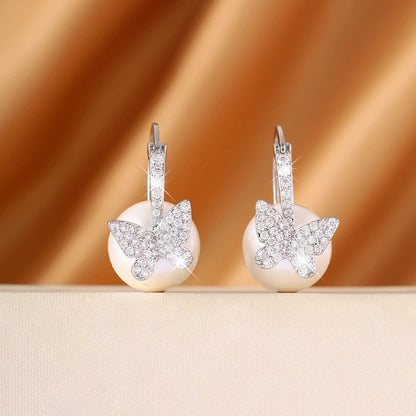 Butterfly Earrings For Women Featuring Electroplated Finish And Copper Studs With Artificial Pearl Inlay