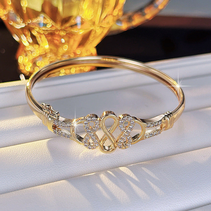 Elaborate Infinity Bangle For Women In Retro Style Featuring Electroplated Copper With Zircon Inlay