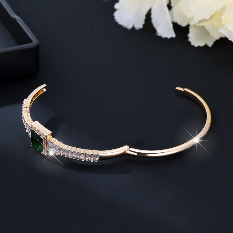 Golden Plated Copper Bangle With Electroplated Finish Featuring May Birthstone Emerald Zircon Inlay